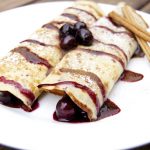 Cinnamon crepes with blueberry compote