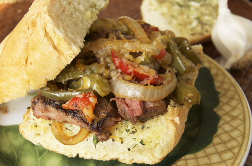 Philly Cheesesteak Sandwich on Garlic Bread