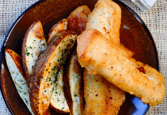 beer battered fish n chips with potato wedges