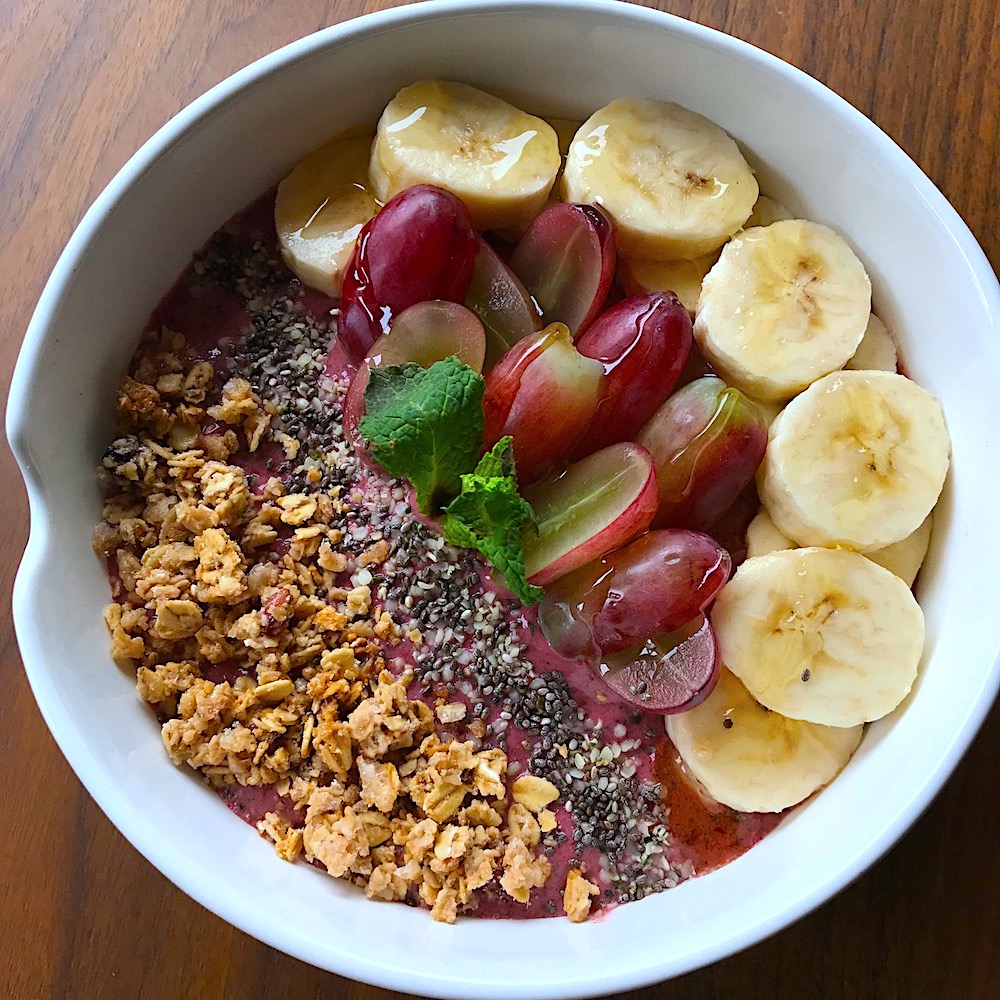 vegan smoothie bowl with coconut milk and mixed berries