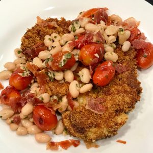 Crispy Parmesan Crusted Cauliflower Steaks with Roasted Tomatoes & White Beans from Eating Well magazine